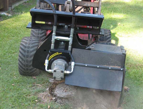 Dingo Mini Digger in action - Tree Stump Grinding