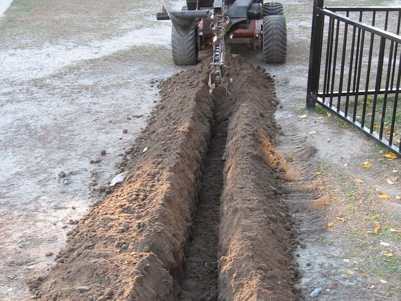 Dingo Mini Digger in action - Digging a trench for storm water or other services